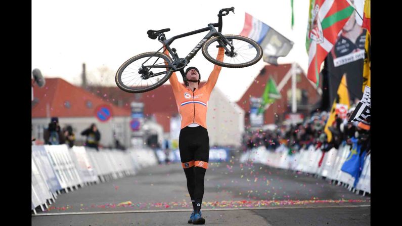 Dutch cyclist Mathieu van der Poel celebrates after winning at the Cyclo Cross World Championships on Sunday, February 3.