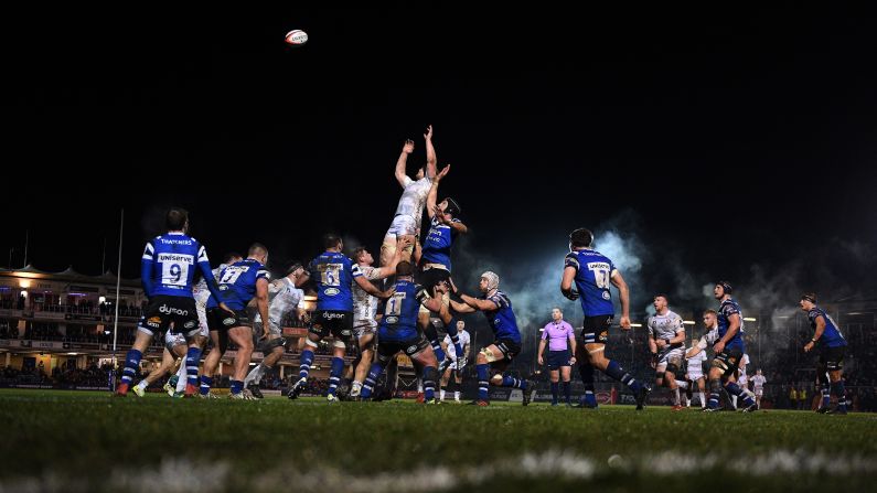 Players are held in the air during a Premiership Rugby Cup match in Bath, England, on Monday, February 4.
