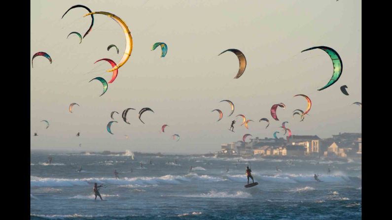 Kitesurfers take advantage of the good wind in Tableview, South Africa, on Wednesday, February 6.