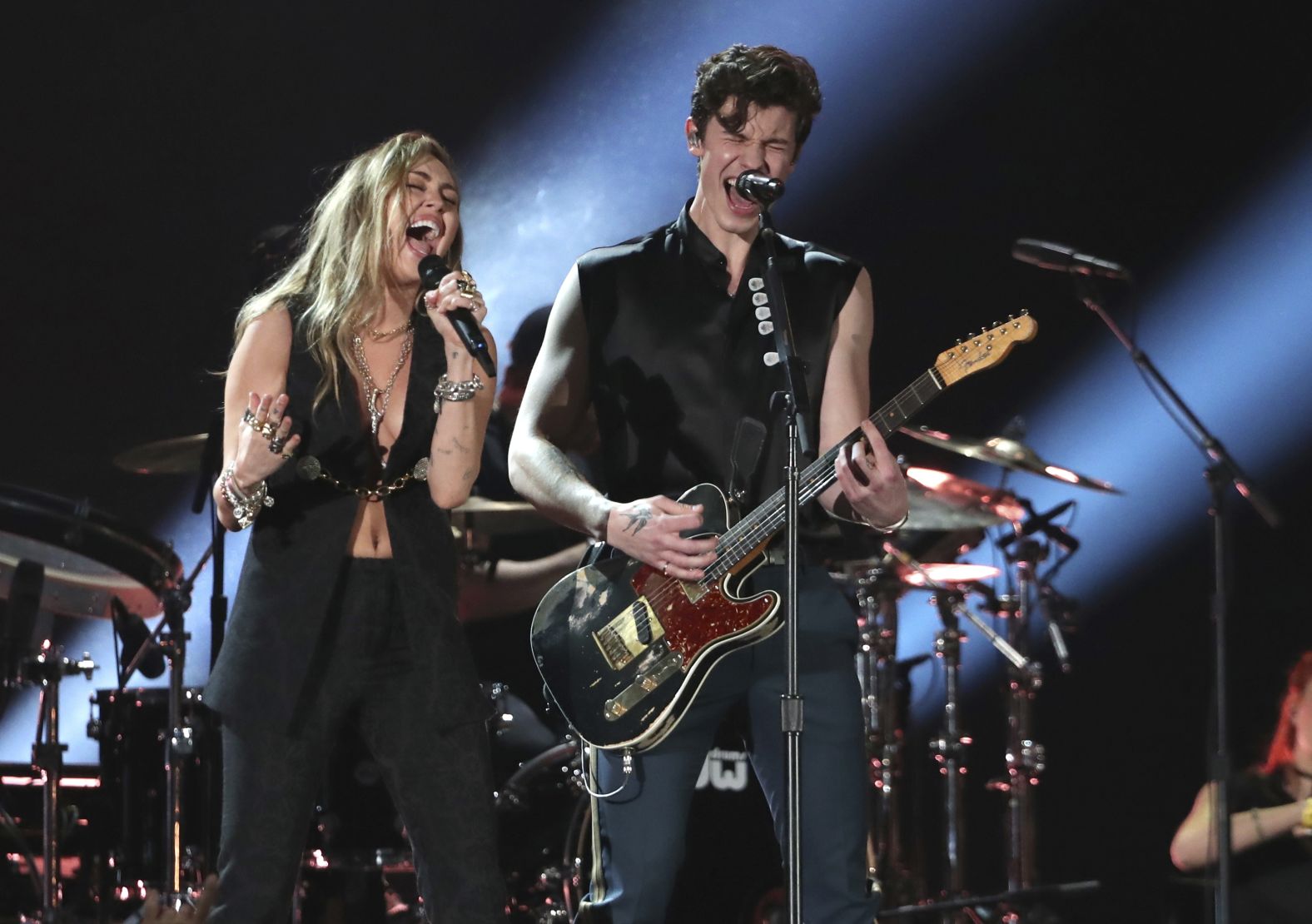 Miley Cyrus and Shawn Mendes perform "In My Blood" during the show's first half-hour.