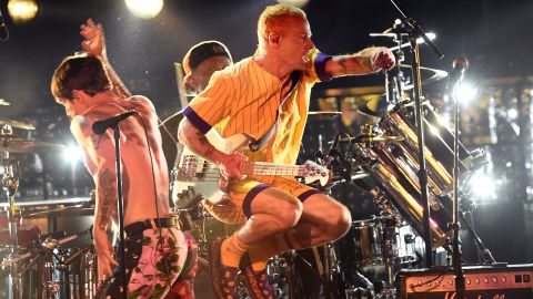 (From left) Anthony Kiedis and Flea of Red Hot Chili Peppers perform during the 61st Annual Grammy Awards at LA's Staples Center on February 10, 2019. 
