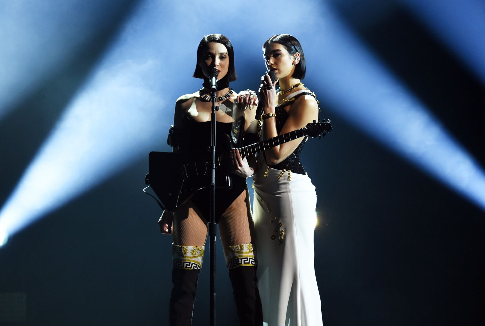 St. Vincent, left, and Dua Lipa sing together near the end of the show. Right after their performance, Lipa won the Grammy for best new artist.