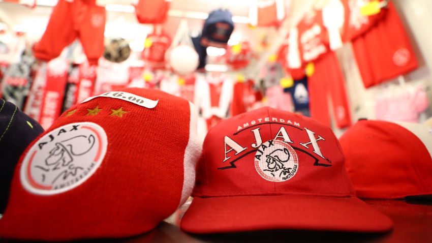 AMSTERDAM, NETHERLANDS - DECEMBER 12:  Merchandise is seen for sale prior to the UEFA Champions League Group E match between Ajax and FC Bayern Muenchen at Johan Cruyff Arena on December 12, 2018 in Amsterdam, Netherlands.  (Photo by Dean Mouhtaropoulos/Getty Images)