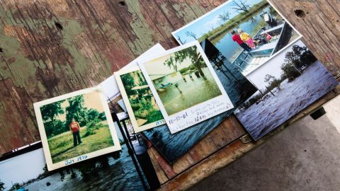 Chris Brunet's family photos show scenes of past life on Isle de Jean Charles, including when homes were flooded.