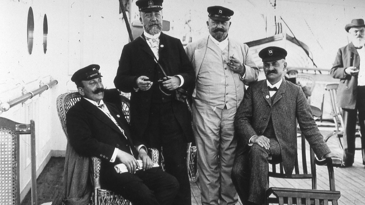 Cruising in 1895. The guy lurking on the far right didn't get the "nautical hat" memo.