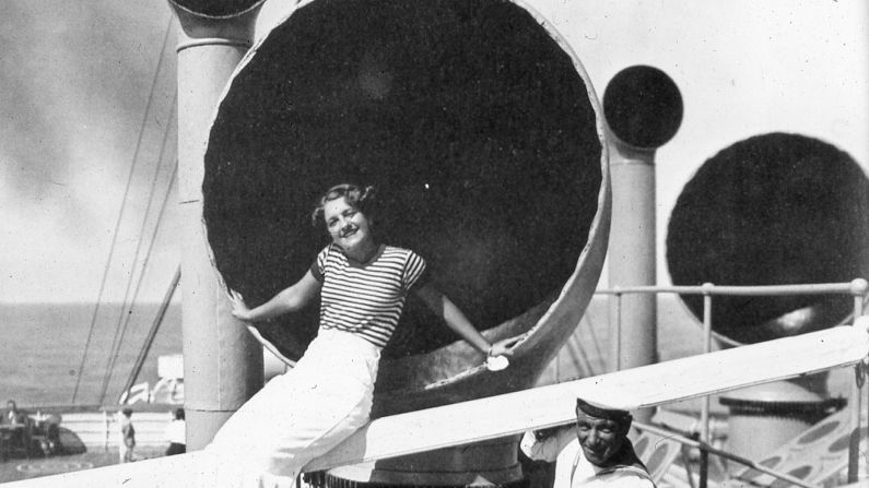 <strong>Early influencer:</strong> Sitting on the rim of a massive funnel might be a dangerous business, but hey, we're all guilty of staging that risky shot for the Insta.
