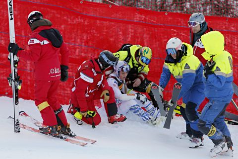 Lindsey Vonn is surrounded after a gruesome fall at the World Championships in Are.