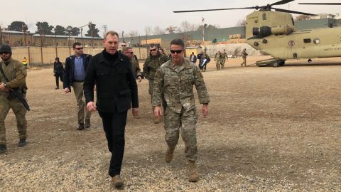 Patrick Shanahan (L) is greeted in Afghanistan by Gen. Austin Scott Miller.