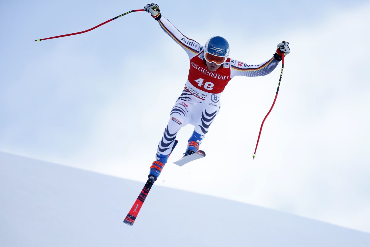 Manuel Schmid takes an insect-like leap during his super-G run at Kitzbuehel.