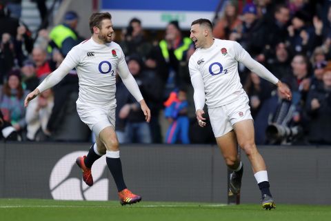England secured its biggest ever victory over France in the Six Nations, outscoring Les Bleus six tries to one. Jonny May (right) grabbed three in the first half. 