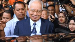 TOPSHOT - Former Malaysia's prime minister Najib Razak leaves the courthouse in Kuala Lumpur on December 12, 2018 after being charged in court. - Malaysian ex-leader Najib Razak and Arul Kanda, the former 1MDB head were charged on December 12 with altering an audit of the state fund at the centre of a scandal which helped topple the last government. (Photo by MOHD RASFAN / AFP)        (Photo credit should read MOHD RASFAN/AFP/Getty Images)