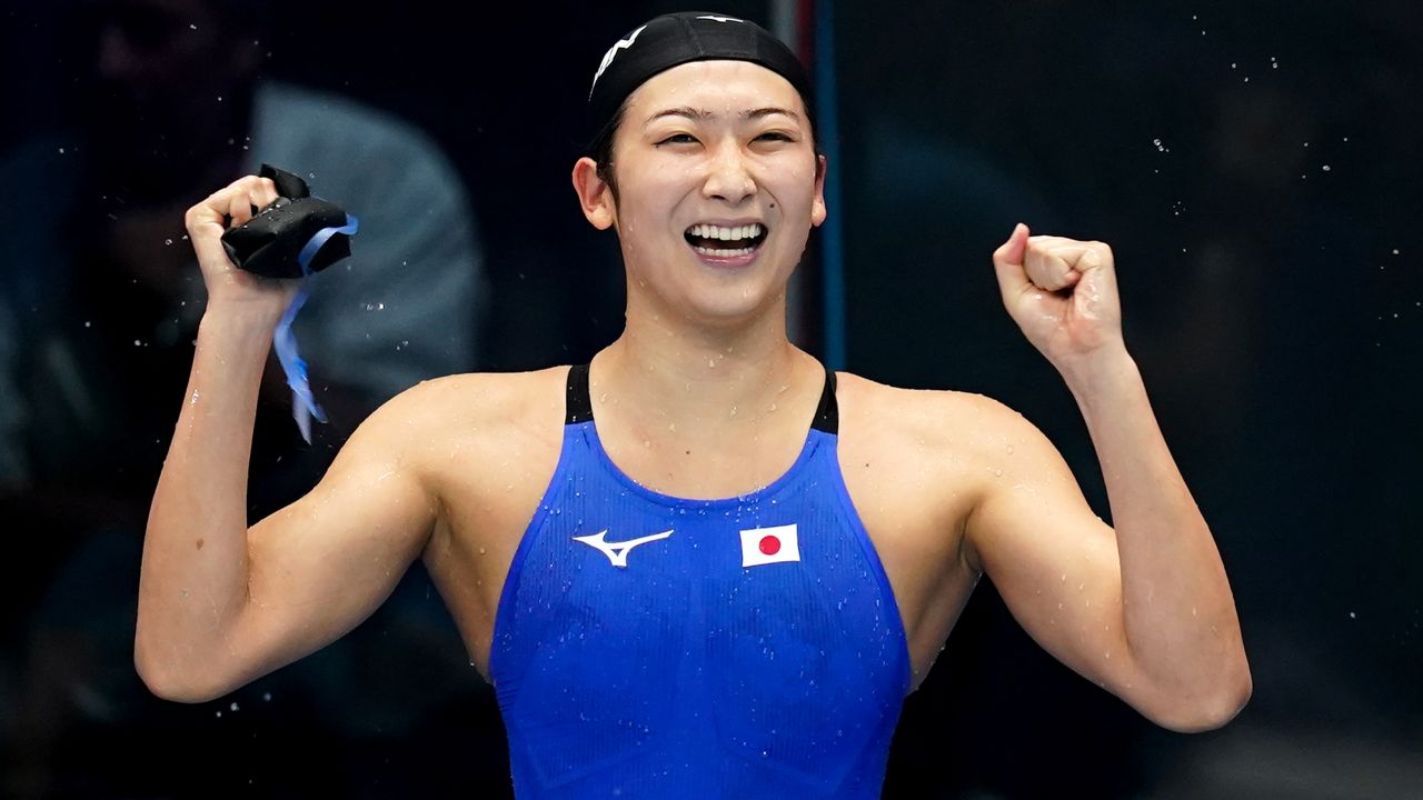 Rikako Ikee of Japan celebrates after winning the 50m freestyle at the Asian Games.