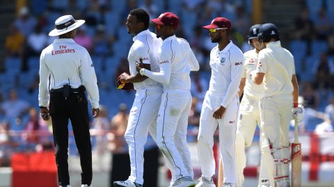 Shannon Gabriel (L) of the West Indies is ushered away by Kraigg Brathwaite after confronting Joe Root and Joe Denly of England.