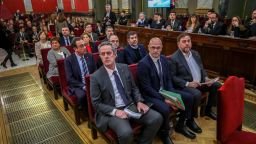 Former Catalan separatist leaders including (from front row R-L) Oriol Junqueras, Raul Romeva, Joaquim Forn, Jordi Sanchez, Jordi Turull, Josep Rull, Jordi Cuixart, Carme Forcadell, Dolors Bassa, Carles Mundo, Santi Vila and Meritxel Borras attend their trial at the Supreme Court in Madrid on February 12, 2019. - Twelve former Catalan leaders go on trial at Spain's Supreme Court for their role in a failed 2017 bid to break away from Spain. (Photo by Emilio Naranjo / POOL / AFP)        (Photo credit should read EMILIO NARANJO/AFP/Getty Images)