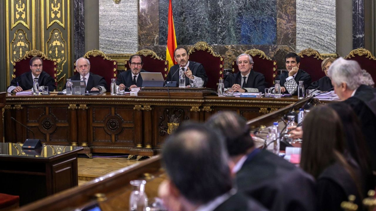 Judge Manuel Marchena (C) speaks next to magistrates during the trial of former Catalan separatist leaders at the Supreme Court in Madrid on February 12.