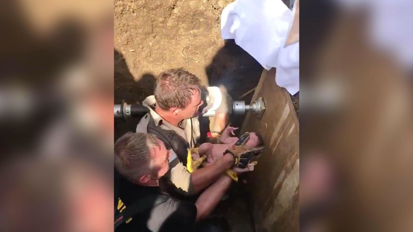 Dramatic moment a newborn baby is rescued from storm drain, Durban, South Africa