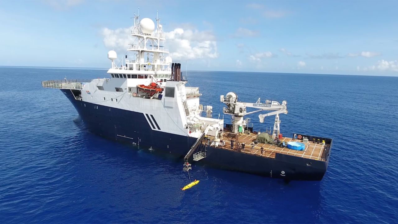 The R/V Petrel deploys its autonomous underwater vehicle (AUV). The robot can probe the ocean floor at depths more than 3.5 miles below the surface.