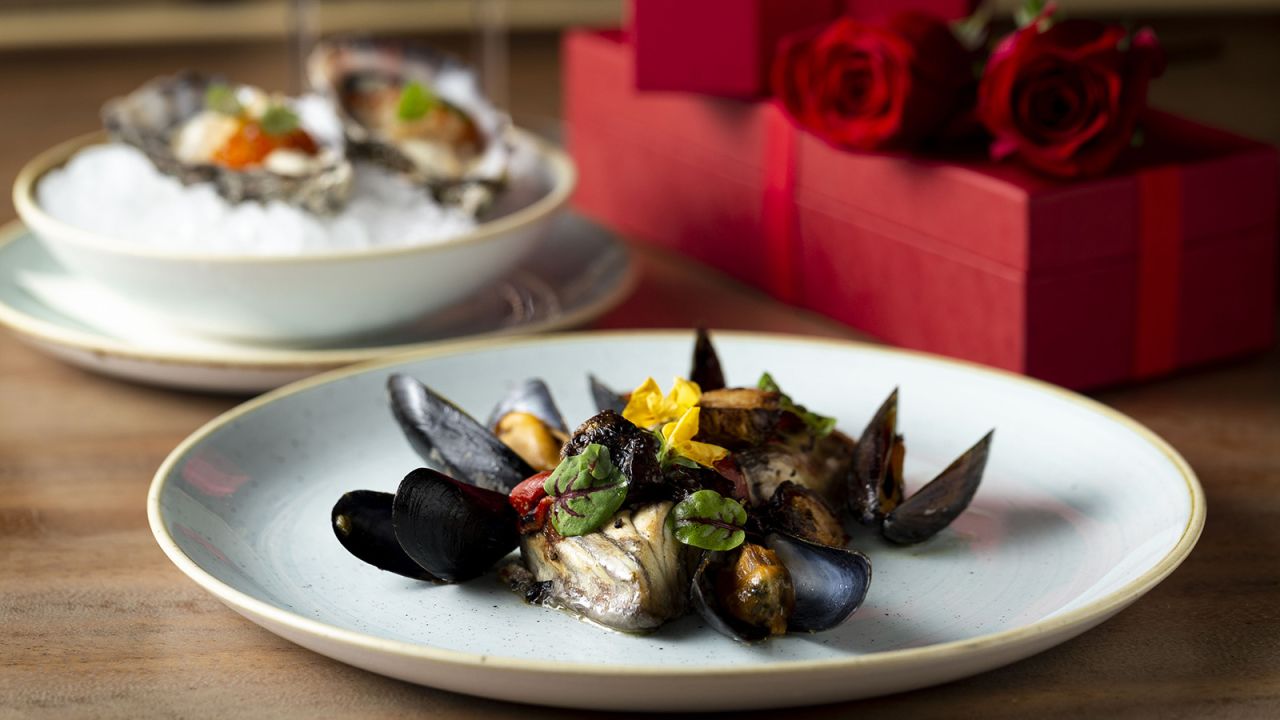 <strong>Valentine's:</strong> And for the season for lovers, Yardbird offered this kingfish hamachi cartocci with Black Bay mussels, white wine, parsley butter, roasted pimento and crispy brussel sprouts. 