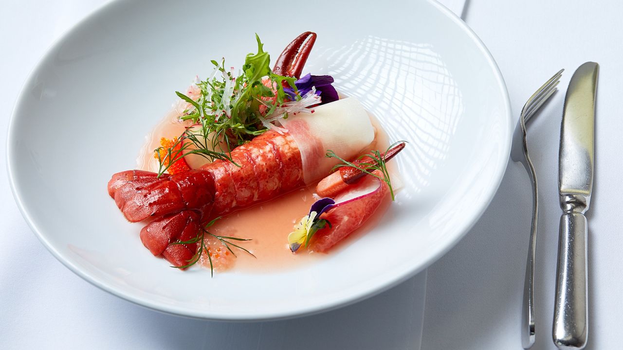 Faultless plates: Executive chef Mark Axisa delivers faultless plates such as this poached Western Australian marron with radishes, aioli, dill, and orange dressing. 