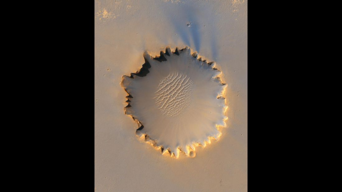 The Mars Reconnaissance Orbiter took this photo of Victoria Crater, about a half-mile in diameter. It was Opportunity's home for 14 of the first 46 months it spent on Mars. 