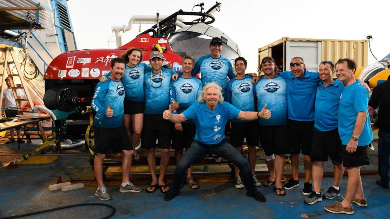 <strong>Team of experts:</strong> The team includes Fabien Cousteau, an underwater explorer -- plus Richard Branson, Virgin billionaire (center) and a team of scientists, explorers and filmmakers from the Aquatica Foundation. CNN Travel spoke to Aquatica Submarines' Erika Bergman, chief pilot, oceanographer and operations manager (second from left) about the experience.