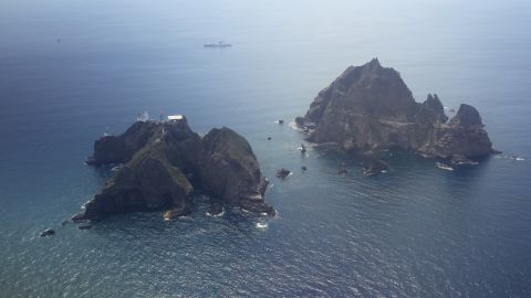 An aerial view of the remote islands disputed with Japan, known as Dokdo in Korea and Takeshima in Japan, in the Sea of Japan (East Sea) on August 10, 2012. South Korean President Lee Myung-Bak paid the unprecedented visit to the remote islands disputed with Japan, sparking anger in Tokyo which recalled its ambassador from Seoul in protest. The South has stationed a small coastguard detachment since 1954 on the islands, whose ownership has been disputed for decades between South Korea and its former colonial ruler Japan. REPUBLIC OF KOREA OUT    AFP PHOTO / DONG-A ILBO        (Photo credit should read DONG-A ILBO/AFP/GettyImages)