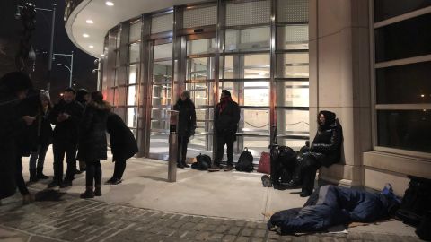 People wait outside the courthouse at 5 a.m. on February 5, the second day of deliberations.