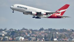 A Qantas Airbus A380 takes off from the airport in Sydney on August 25, 2017. - Australia's Qantas unveiled plans for the world's longest non-stop commercial flight on August 25, 2017 calling it the "last frontier of global aviation", as it posted healthy annual net profits on the back of a strong domestic market. (Photo by PETER PARKS / AFP)        (Photo credit should read PETER PARKS/AFP/Getty Images)