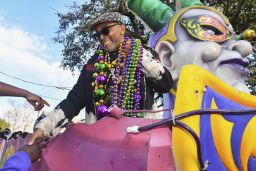 Spike Lee rides in Zulu's 2018 parade.