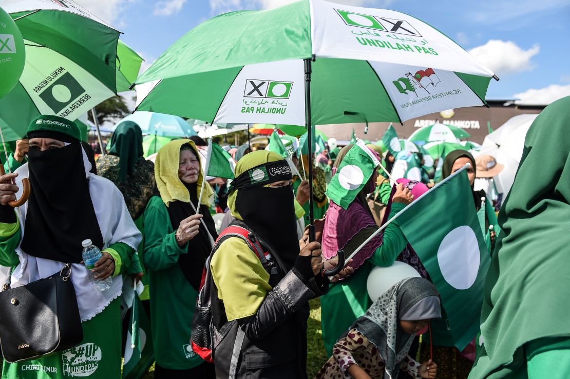 Supporters of the Malaysia Islamic Party (PAS) gather during the election nomination day in Pekan on April 28, 2018.