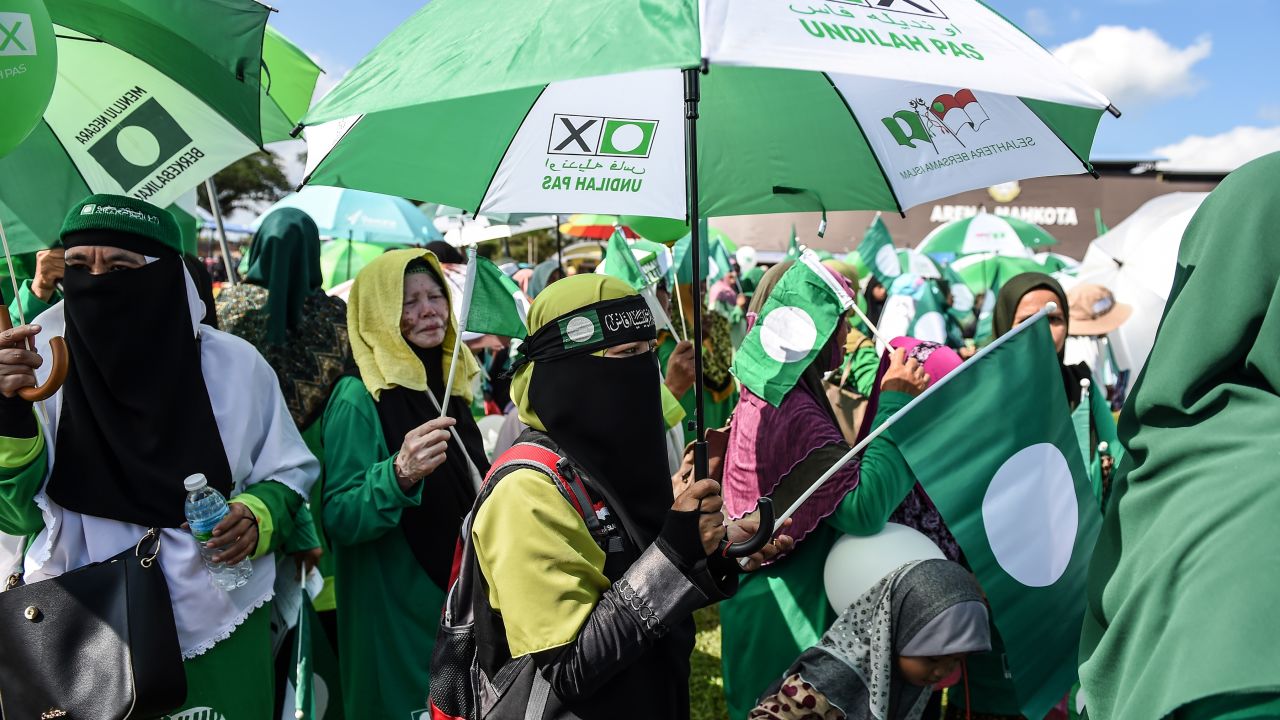 Supporters of the Malaysia Islamic Party (PAS) gather during the election nomination day in Pekan on April 28, 2018.