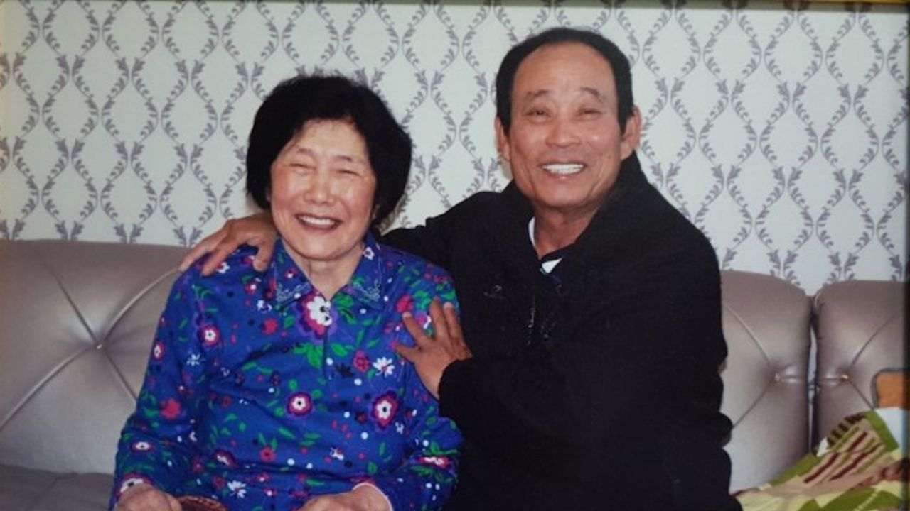Kim Sin-yeol, the sole permanent resident of the South Korean-administered Dokdo Islands, with her late husband. The islands are called Takeshima by Japan, which also claims ownership.
