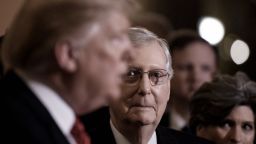 Then-President Donald Trump talks to the press as then-Senate Majority Leader Mitch McConnell looks on after the Republican luncheon at the Capitol Building on January 9, 2019. 