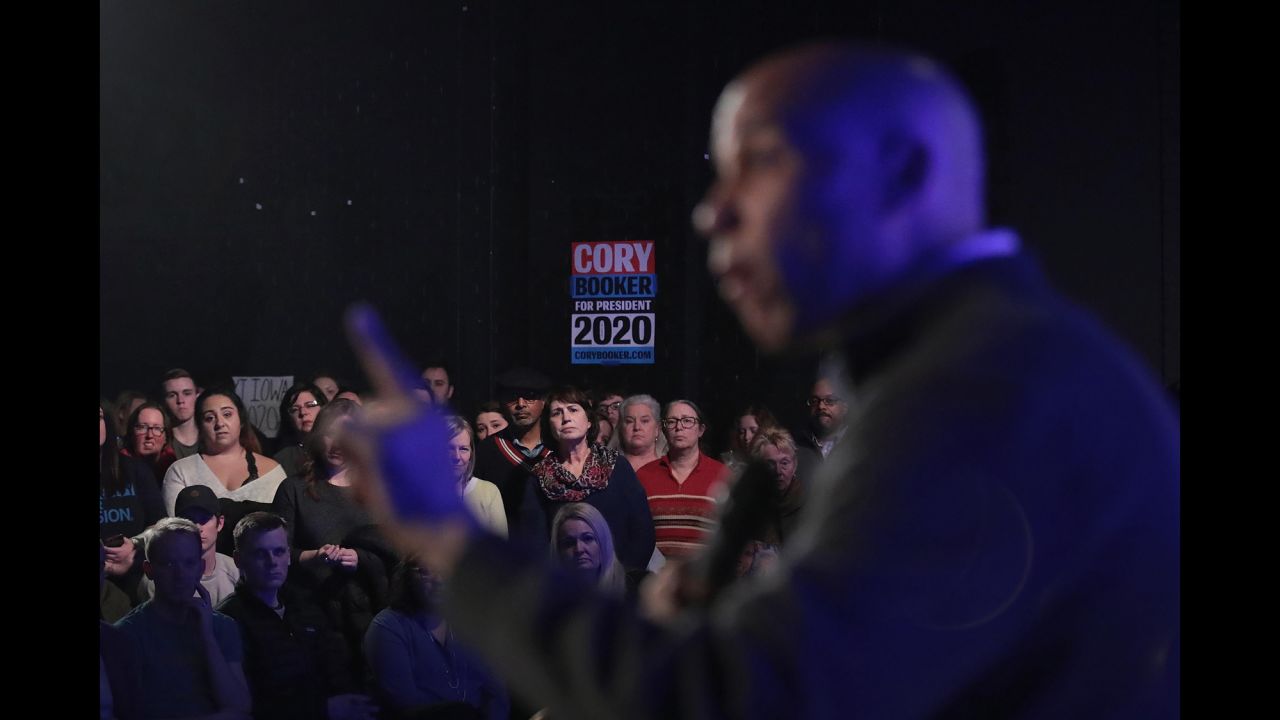 People watch US Sen. Cory Booker speak at a campaign stop in Des Moines, Iowa, on Saturday, February 9. Booker announced February 1 <a href="https://www.cnn.com/2019/02/01/politics/cory-booker-announces-presidential-run-2020/index.html" target="_blank">that he was running for President.</a>
