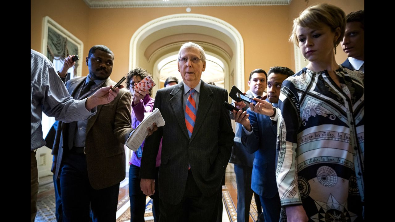 Senate Majority Leader Mitch McConnell leaves the Senate floor after senators <a href="https://www.cnn.com/2019/02/14/politics/donald-trump-wall-funding-bill/index.html" target="_blank">voted on a budget bill</a> in Washington on Thursday, February 14. He said President Donald Trump plans to sign the bill, a border security compromise that falls short of providing the $5 billion in wall funding Trump wanted. McConnell said the President would declare a national emergency to secure the funding for the wall.