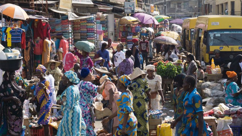 People walk through Balogun market in streets around Lagos Island on May 5, 2017.
Lagos is the world's 10th largest city with between 17 and 22 million people, although no-one seems to be counting. / AFP PHOTO / STEFAN HEUNIS (Photo credit should read STEFAN HEUNIS/AFP/Getty Images)