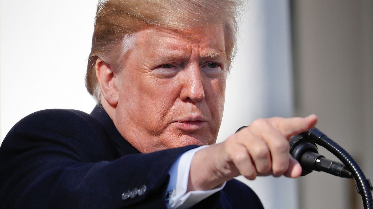 President Donald Trump points to a member of the media while taking questions after speaking during an event in the Rose Garden at the White House to declare a national emergency in order to build a wall along the southern border, Friday, Feb. 15, 2019 in Washington. (AP Photo/Pablo Martinez Monsivais)