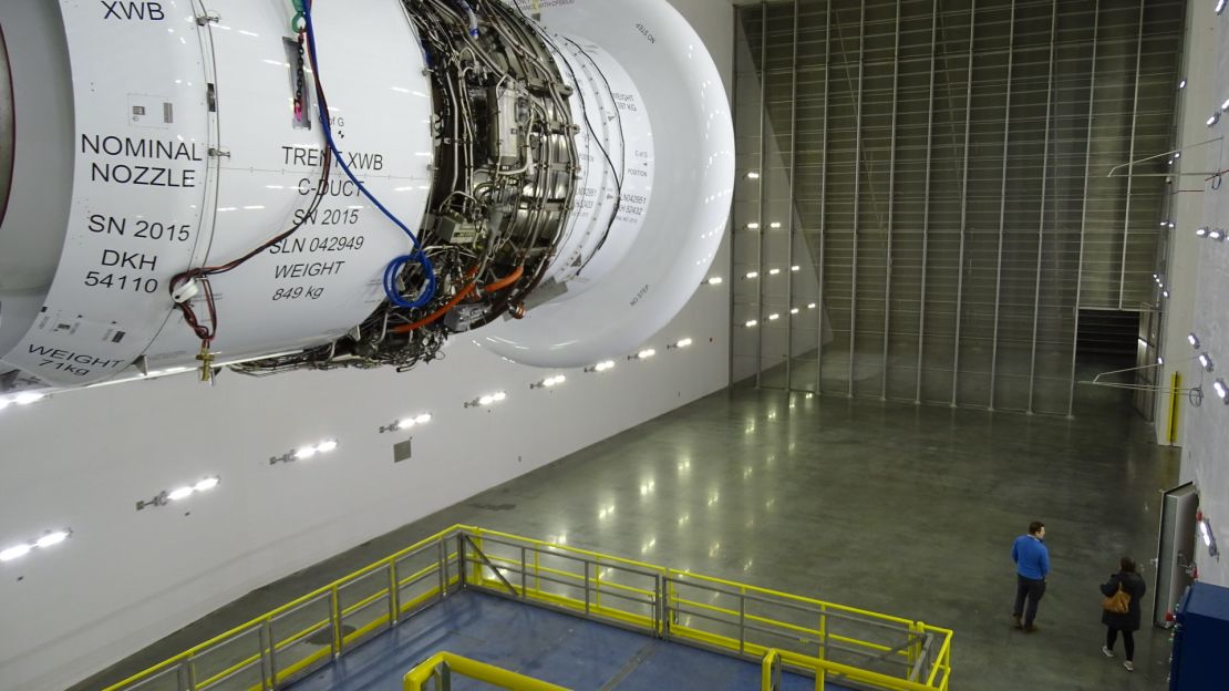 A Rolls-Royce Trent XWB turbofan jet engine hangs above Delta's new test cell in Atlanta. 