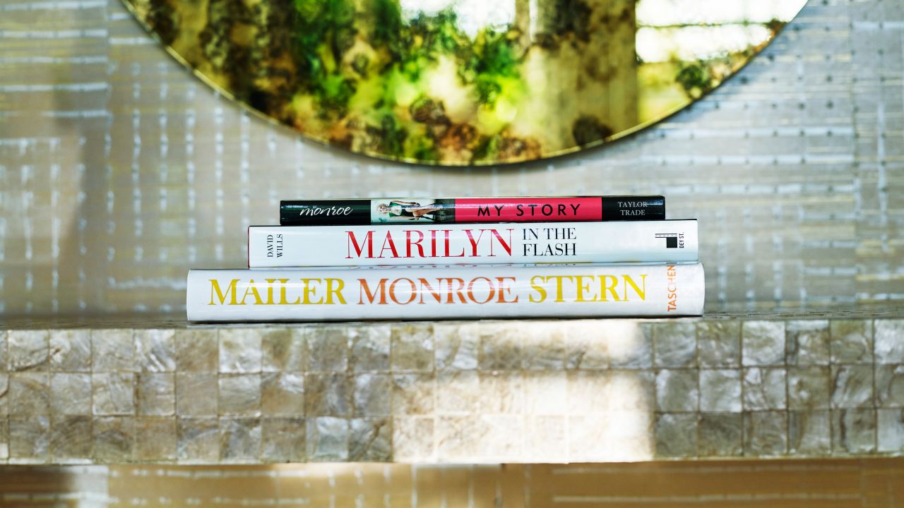<strong>Have a read (or a watch):</strong> The bungalow provides plenty of reading material about the actress, along with some of her most popular movies.