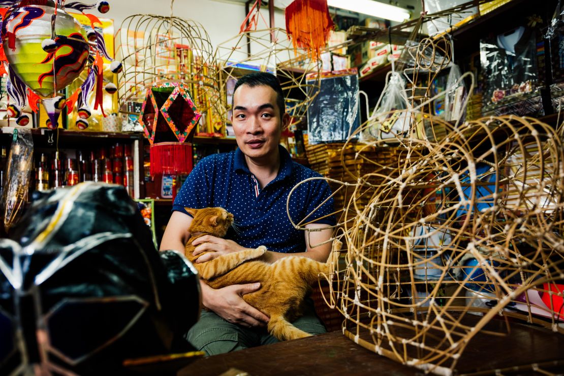 Au-yeung Ping-chi hand-makes paper effigies, which are burned as offerings to the deceased.