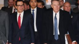 US Treasury Secretary Steven Mnuchin (front L) and US Trade Representative Robert Lighthizer (front R) leave a hotel on the way to trade talks in Beijing on February 15, 2019. (Photo by GREG BAKER / AFP)        (Photo credit should read GREG BAKER/AFP/Getty Images)