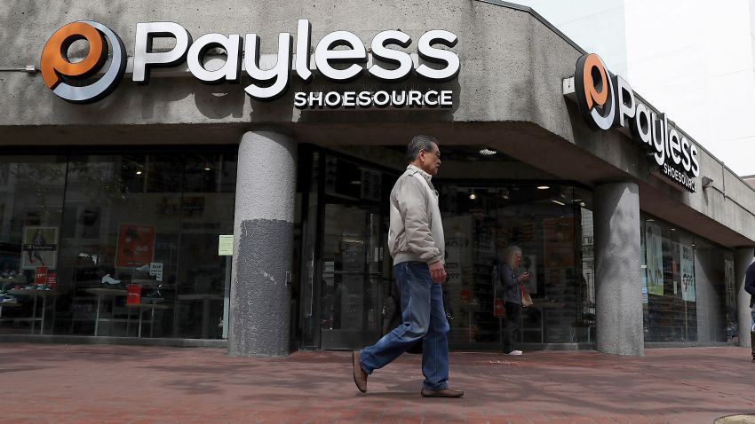 SAN FRANCISCO, CA - APRIL 05:  A pedestrian walks by a Payless Shoe Source store on April 5, 2017 in San Francisco, California.  Kansas-based discount shoe retailer Payless Shoe Source has filed for Chapter 11 bankruptcy and will close nearly 400 of its stores. (Photo by Justin Sullivan/Getty Images)
