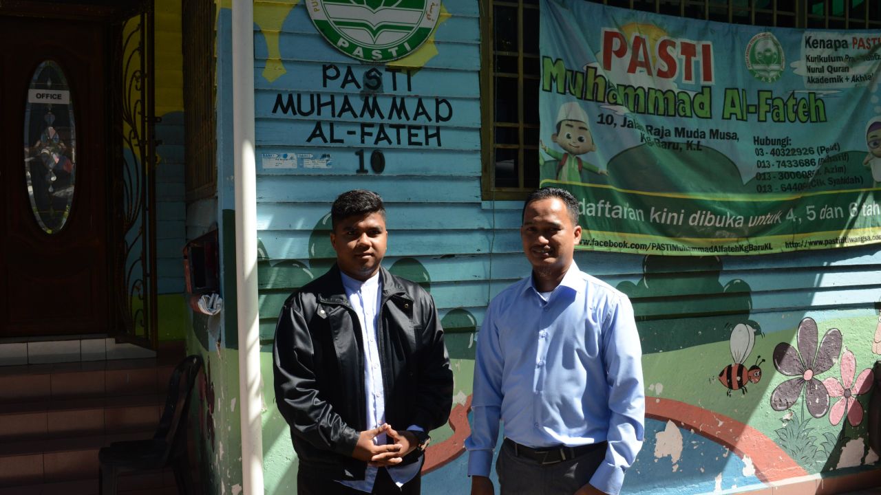 Azim Awi (right) manages a kindergarten run by the Malaysian Islamic Party, in Kampong Bharu, a traditional Malay village in the heart of Kuala Lumpur.