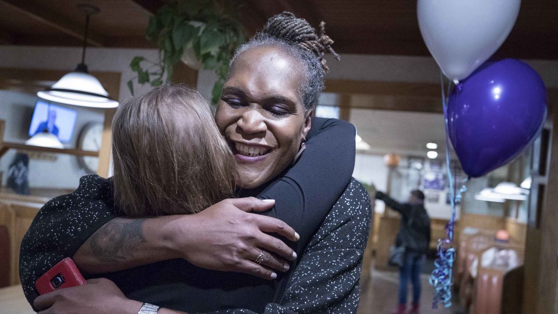 Andrea Jenkins hugs a supporter in 2017, upon winning a Minneapolis City Council seat. 