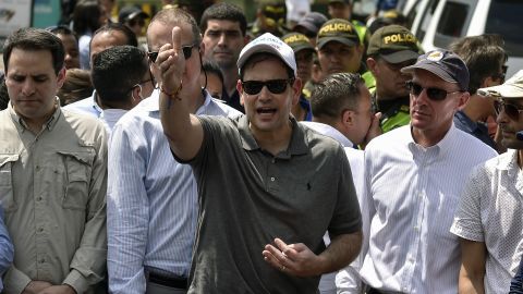 US senator Marco Rubio (C) gestures as he walks at the Simon Bolivar international bridge in Cucuta, Colombia, border with San Antonio de Tachira, Venezuela on February 17, 2019.