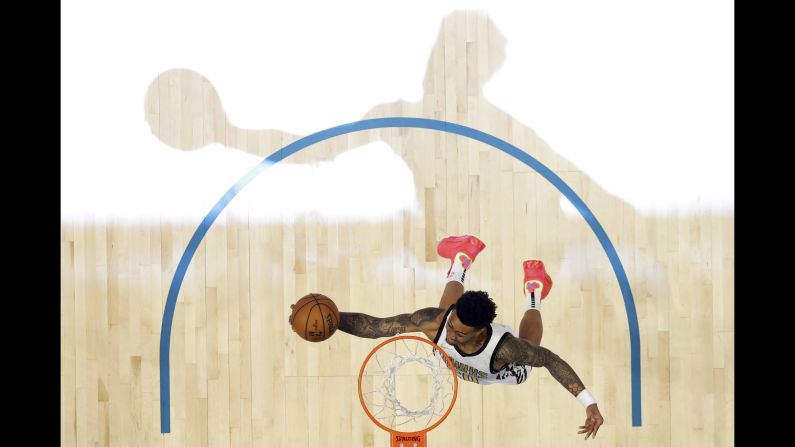 The Atlanta Hawks' John Collins dunks the ball during the NBA All-Star Slam Dunk contest on Saturday, February 16.