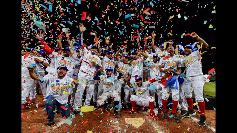 Players for Panama's Toros de Herrera celebrate their victory over Cuba's Lenadores de las Tunas during the Caribbean Series baseball tournament final game at Rod Carew stadium in Panama City on Sunday, February 10.