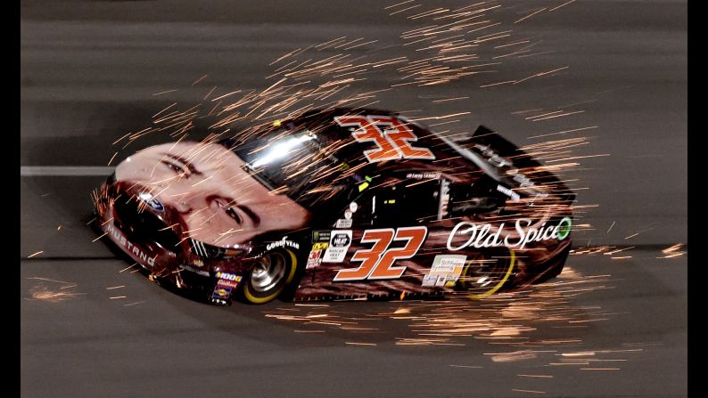 NASCAR Cup Series driver Corey LaJoie gets a front end full of sparks in turn four during the Gander RV Duel 2 at Daytona International Speedway on Thursday, February 14.