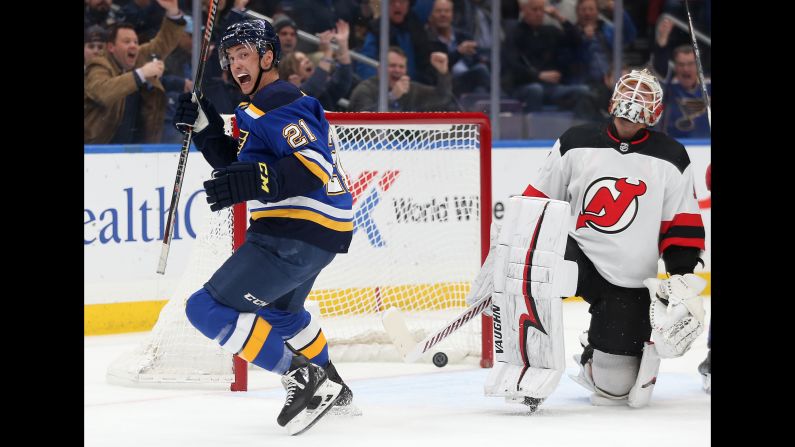 New Jersey Devils goaltender Keith Kinkaid can't watch as the St. Louis Blues' Tyler Bozak celebrates a goal by teammate Jaden Schwartz in the first period at the Enterprise Center in St. Louis on Tuesday, February 12.