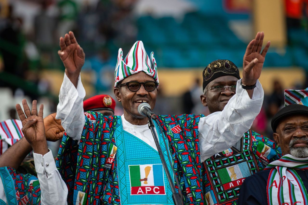 Buhari waves to a crowd of supporters during a campaign rally in Lagos, Nigeria, in February 2019.
